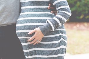 talk to unborn baby listening talking reading